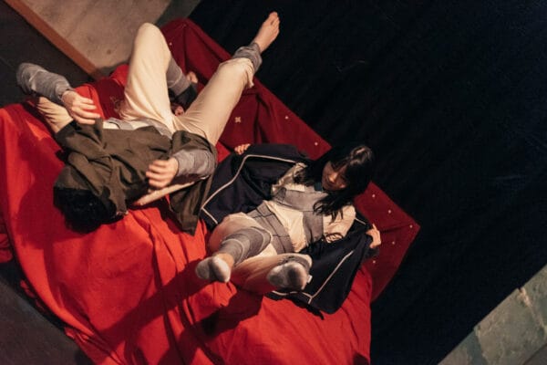 Bed time! Andrew Woolner and Naoe Kawamoto.
Photo by John Matthews